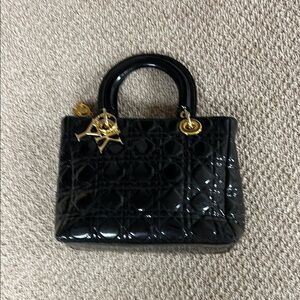 Black Quilted leather Handbag with Gold Accents